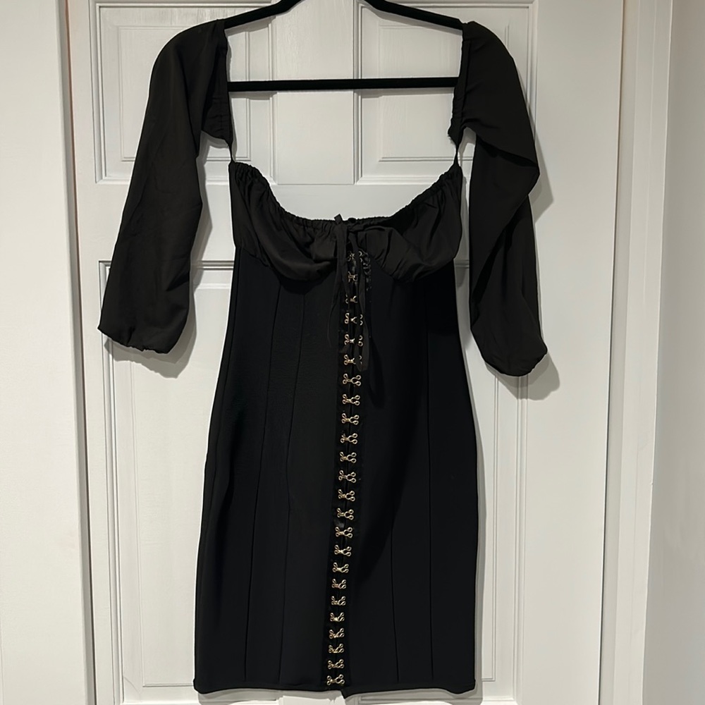 Black Tight Long Sleeve Dress. With Gold Detailing